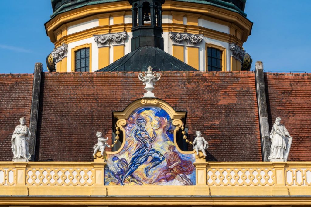 Painting of a striding figure looking into a mirror at Melk Abbey