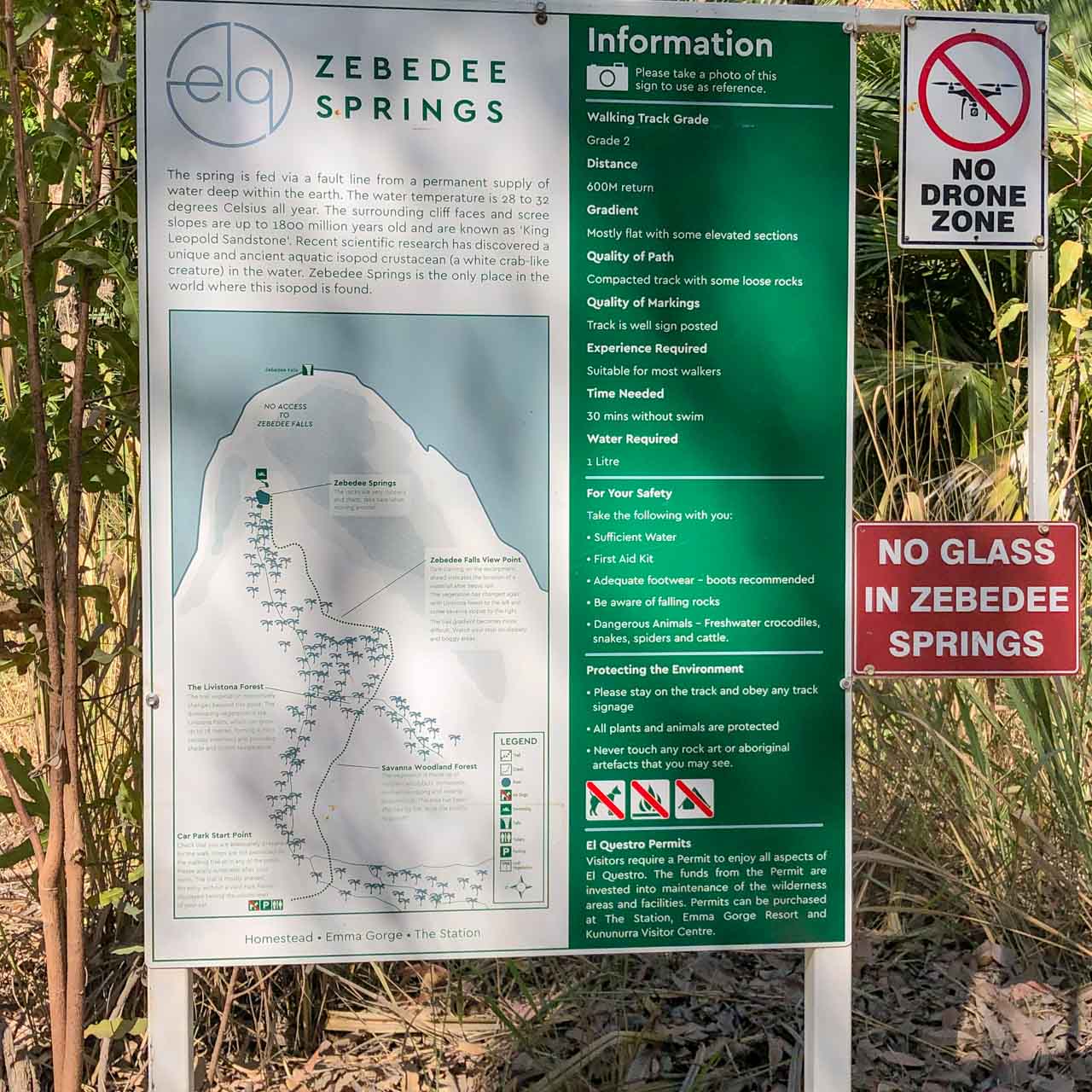 A sign showing walking information to a thermal spring