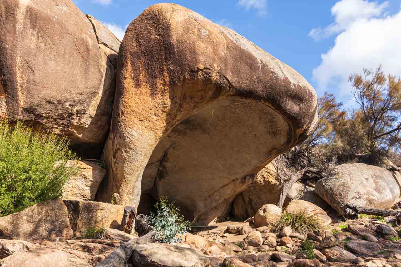 A large rock that looks like a hippo yawning