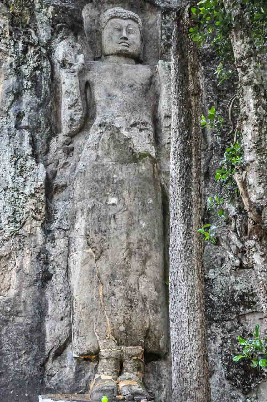 An 11-metre image of Buddha is carved into the rock.