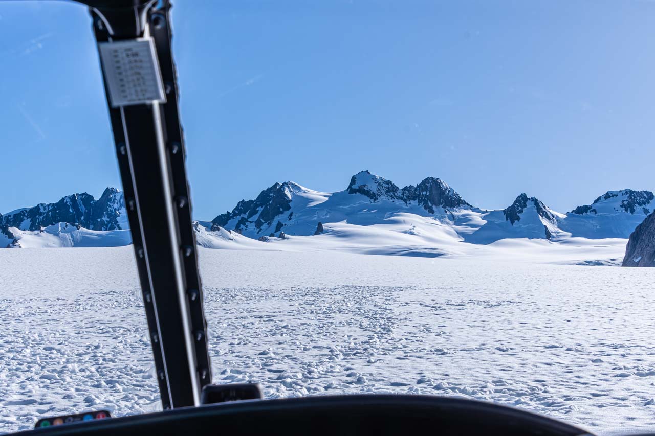 New Zealand's Southern Alps at the top of Franz Josef Glacier, viewed from inside a helicopter.