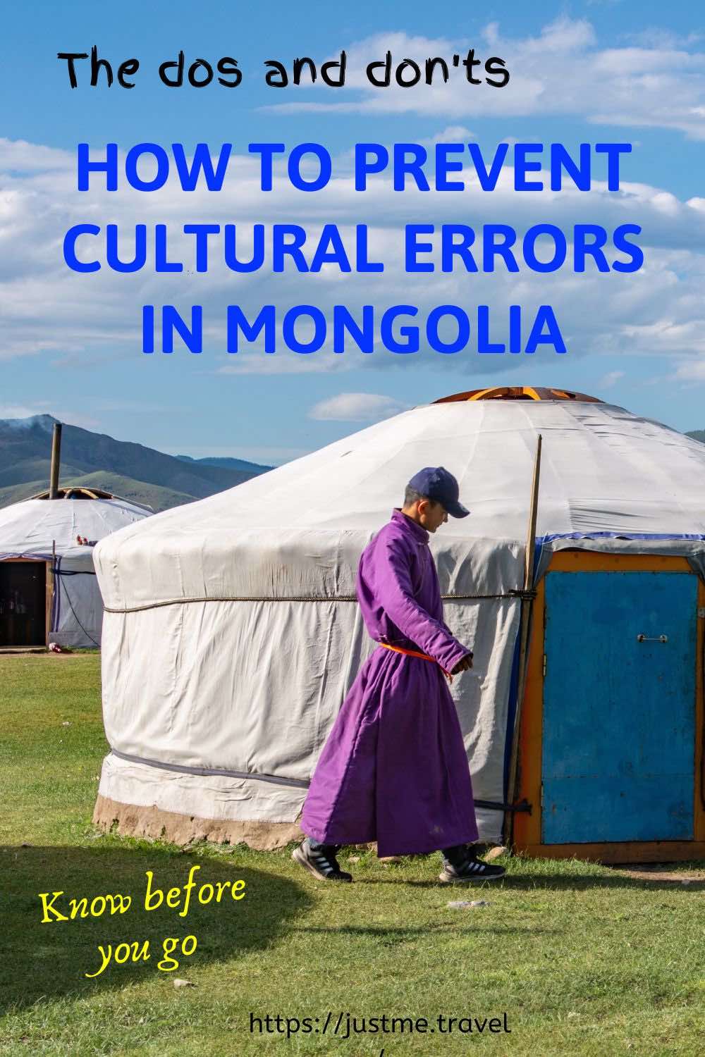 A Mongolian nomadic man in tradition garb walks in front of a ger. There is a second ger behind the first and a mountain in the background.