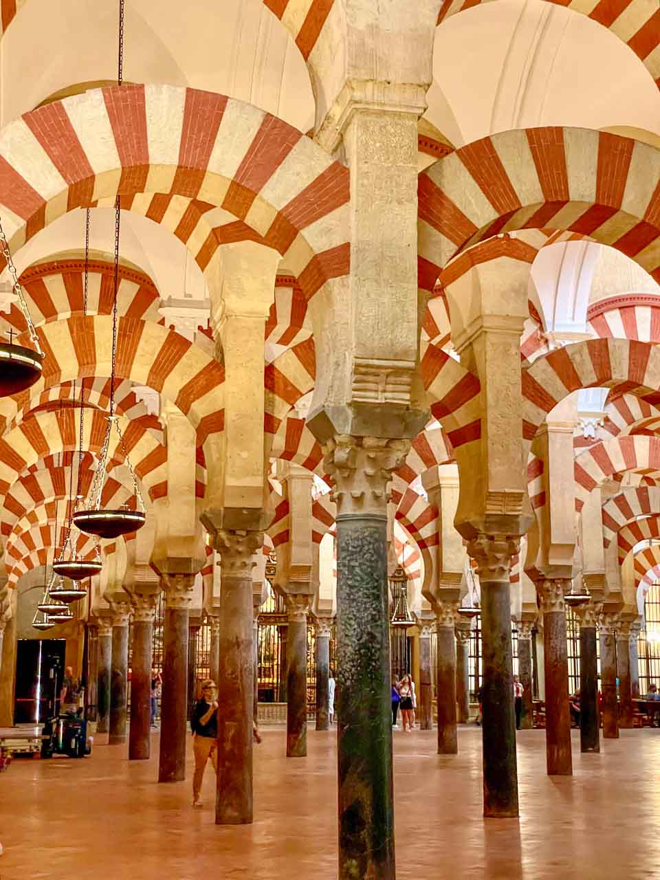 Several Islamic double-arched columns in a section of the Mosque-Cathedral of Cordoba.