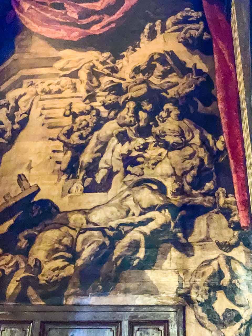 A painting inside a cathedral representing the mystery of redemption.