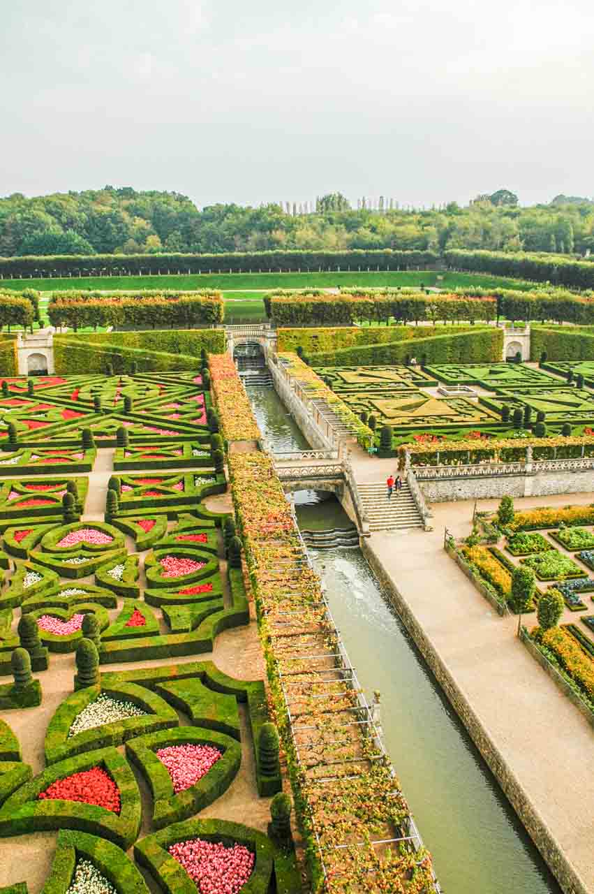 The formal gardens set out in terraces at a French castle.